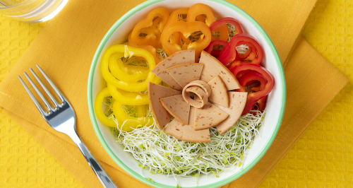 Tomato charcuterie with bean sprouts and pepper rings  