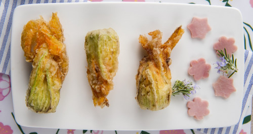 Courgette flowers stuffed with cooked ham and ricotta cheese