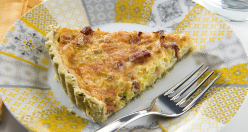 Quiche with basil shortcrust pastry, leeks, and diced bacon