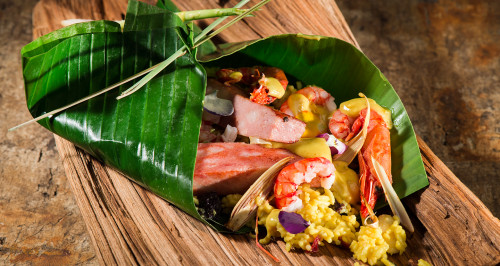PAPILLOTE OF BANANA TREE LEAF WITH BOLOGNA, PRAWNS, LEMON GRASS AND CURRY RICE