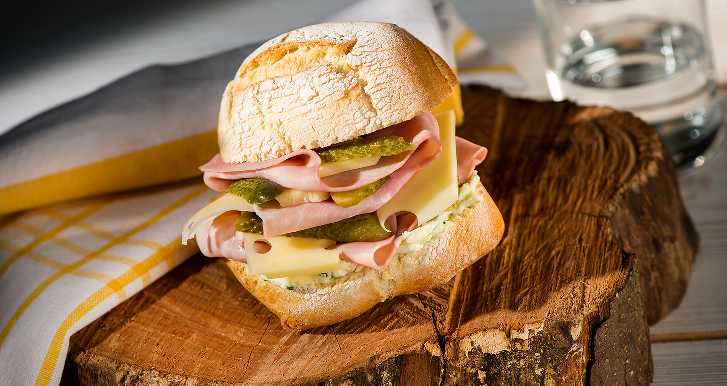 COOKED HAM SANDWICH, EMMENTALER CHEESE, HERB BUTTER, PICKLED CUCUMBERS